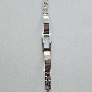 Sophisticated Women's Silver and Brown Watch